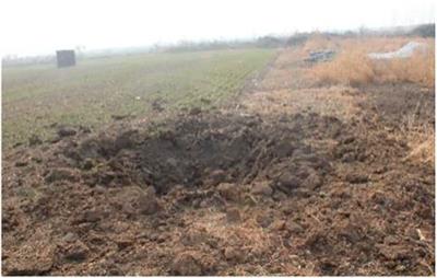 Crater effects of shallow burial explosions in soil based on SPH-FEM analysis